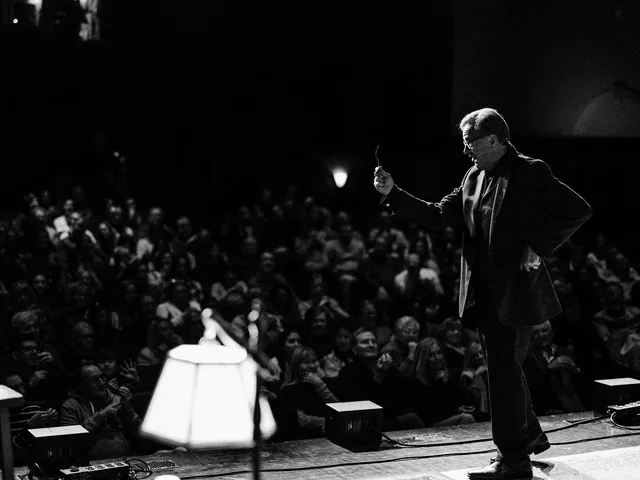 Rich Crawford performing a mentalism show on stage